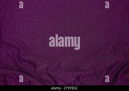 Fond de tissu violet foncé drapé avec fil de lurex argenté Banque D'Images