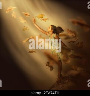 Portrait d'une adolescente tendant la main pour tomber des feuilles d'automne Banque D'Images