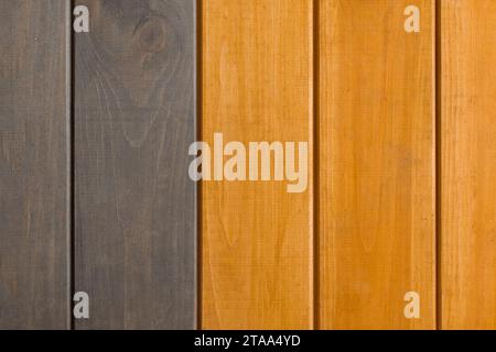 Lignes verticales en bois rayures planches surface deux 2 couleurs Orange gris peinture texture fond. Banque D'Images