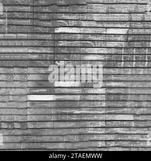 Fond de mur en béton dépoli gris. Photo carrée d'un mur de pierre. Banque D'Images