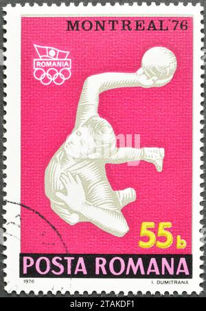 Timbre-poste annulé imprimé par la Roumanie, qui montre Handball, Jeux olympiques d'été 1976 - Montréal, vers 1976. Banque D'Images