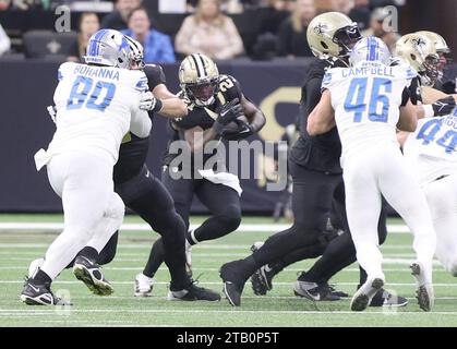 La Nouvelle-Orléans, États-Unis. 03 décembre 2023. Les Saints de la Nouvelle-Orléans Running back Jamaal Williams (21 ans) se précipite pour un match de la National football League au Caesars Superdome à la Nouvelle-Orléans, Louisiane, le dimanche 3 décembre 2023. (Photo de Peter G. Forest/Sipa USA) crédit : SIPA USA/Alamy Live News Banque D'Images