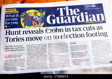Jeremy «Hunt révèle 20 milliards de livres sterling de réductions d'impôts alors que les conservateurs se déplacent sur pied électoral» journal Guardian titre économie britannique 21 novembre 2023 Londres Royaume-Uni Banque D'Images