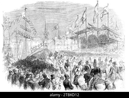 Entrée du roi de Prusse dans K&#xf6;nigsberg : la procession à la Grune Thor - d'après un croquis de notre artiste spécial, 1861. "Les larges rues de la Vorstadt [dans ce qui est maintenant Kaliningrad] ne s'étendent pas au-delà du GR&#xfc;ne-pont sur la rivière Pregel, ce qui forme là l'entrée dans la vieille ville, sur le côté de la ville dont le premier bâtiment est la Bourse, sur les plates-formes devant lesquelles étaient rassemblés les hommes marchands de la ville et leurs familles, dont l'apparence a donné toutes les preuves de confort et de richesse. Dans la rivière, à la fois au-dessus et en dessous du pont à ce point, le vessé Banque D'Images