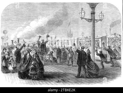 Renforts pour le Canada : les gardes quittent la gare de South-Western Railway pour Southampton, 1861. Guerre de Sécession : les troupes britanniques en route pour protéger la colonie britannique du Canada contre une attaque possible de l'Amérique. «...un grand nombre de personnes se sont rassemblées à une heure précoce au Wellington Barracks, St. James's Park, à l'occasion du départ du 1e bataillon des Grenadier Guards et du 2e bataillon des Fusilier Guards pour le Canada. Le 1e bataillon, fort de 800 hommes, sous le commandement du colonel Hugh Manvers Percy... partit pour la station Waterloo du South-WE Banque D'Images