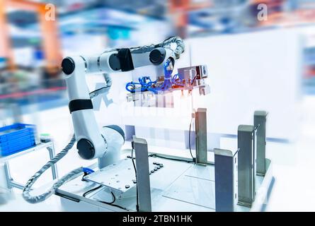 Bras robotique lignes de production industrielle moderne de la technologie. Cellule de production automatisée. Banque D'Images
