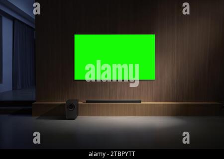 Les gens regardent et apprécient à côté de la télévision, moniteur avec écran vert Banque D'Images