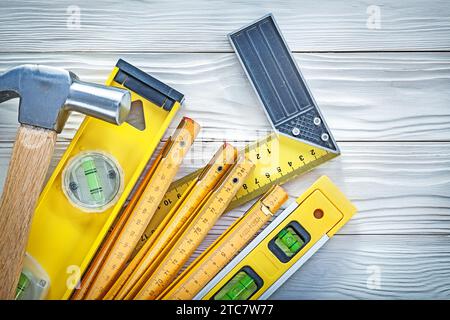 Marteau à griffes en bois mètre de construction de niveau carré ruleron tableau blanc Banque D'Images