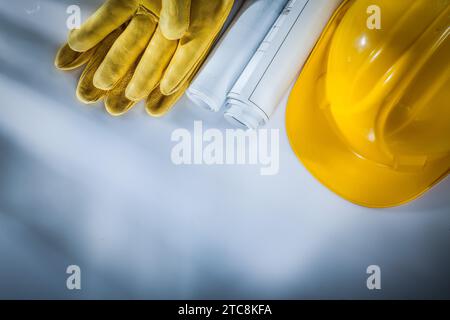 Dessins de construction de gants de sécurité de casque de construction sur fond blanc Banque D'Images