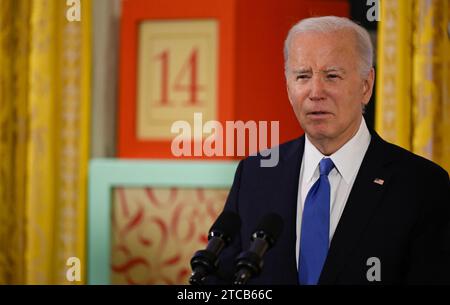 Le président des États-Unis Joe Biden fait des remarques alors qu'il organise une réception Hanukkah dans la salle est de la Maison Blanche à Washington, DC, le 11 décembre 2023. Copyright : xPoolxviaxCNPx/MediaPunchx crédit : Imago/Alamy Live News Banque D'Images