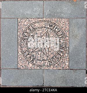 Austin, Texas - 3 novembre 2023 : étoile de willie nelson au Walk of stars à trinity Street à Austin Texas. Banque D'Images