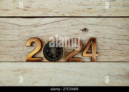 Bonne année 2024 lettre avec décoration de Noël sur fond bleu Photo Stock -  Alamy