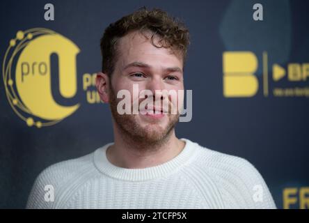 Munich, Allemagne. 12 décembre 2023. Ben Münchow, acteur, assiste à la première mondiale du film « 791 KM ». Crédit : Sven Hoppe/dpa/Alamy Live News Banque D'Images