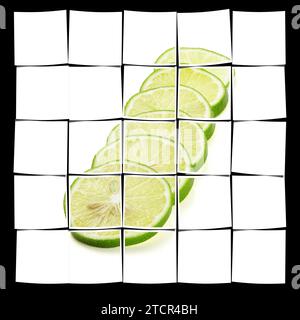 Tranches de citron vert frais isolées sur fond blanc Banque D'Images