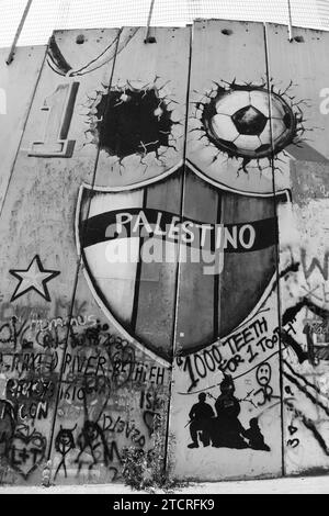 Peintures murales sur la barrière de sécurité israélienne à Bethléem, Palestine. Banque D'Images