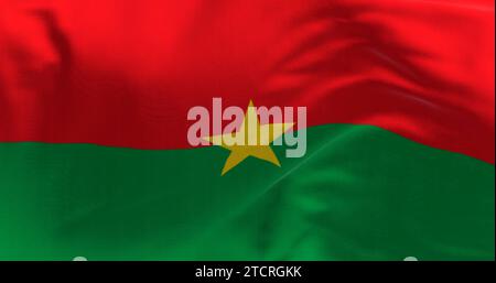 Gros plan du drapeau national du Burkina Faso agitant. Deux bandes horizontales égales rouges et vertes avec une étoile jaune à cinq branches au centre. illustration 3d. Banque D'Images