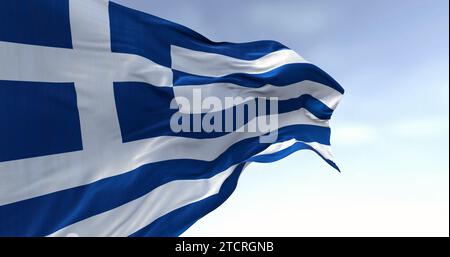 Gros plan du drapeau national de la Grèce agitant dans le vent par temps clair. Bandes bleues et blanches avec un canton bleu portant une croix blanche. illustration 3d. Banque D'Images