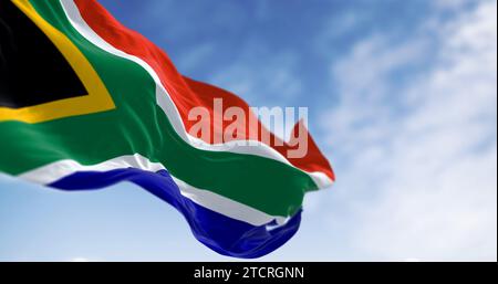 Détail du drapeau de l'Afrique du Sud. Drapeau rouge et bleu divisé par un y vert qui entoure un triangle noir avec une bordure jaune. 3d illustration réf Banque D'Images