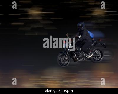 blur santa claus moto transport en mouvement à l'extérieur roues de vitesse de fond guidon superbike Banque D'Images