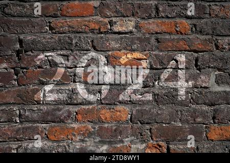 2024 texte blanc du nouvel an écrit sur le vieux mur de briques. Banque D'Images