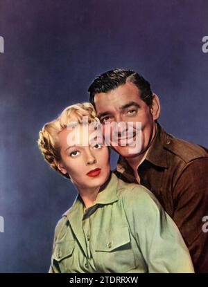 Clark Gable et Lana Turner jouent dans 'Homecoming' (1948), un drame romantique qui se déroule dans le contexte de la Seconde Guerre mondiale Gable joue le colonel de l'armée américaine Ulysses Delby « Lee » Johnson, un chirurgien, tandis que Turner incarne le lieutenant Jane « Snapshot » McCall, une infirmière. Leurs personnages, tous deux servant dans la guerre, se trouvent attirés les uns vers les autres au milieu des défis du service et du devoir. Banque D'Images