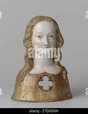 Buste reliquaire d'une des vierges de Sainte Ursula, anonyme, c. 1325 - c. 1349 les cheveux séparés d'Ursula (ou d'un de ses cozets) tombent le long du visage en vagues jusqu'au-dessus des épaules. Elle porte une robe bien assise. Ouverture en forme de quatre passes dans la poitrine. Noix de Cologne (bois dur). lin (matériel) les cheveux séparés d'Ursula (ou d'un de ses cozets) tombent le long du visage en vagues jusqu'au-dessus des épaules. Elle porte une robe bien assise. Ouverture en forme de quatre passes dans la poitrine. Noix de Cologne (bois dur). lin (matériel) Banque D'Images