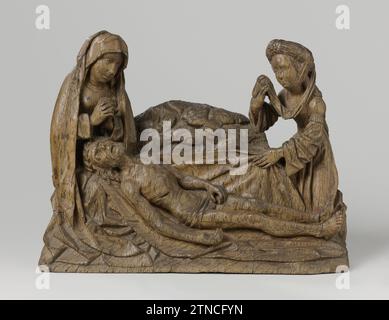 La Lamentation, c. 1500 sur un sol, le Christ est étendu sur une ligne entre Maria et Maria-Magdalena. En arrière-plan un petit calvaire, sur lequel une récolte. Maria est assise sur ses genoux avec la tête couronnée du Christ. Elle garde les mains pliées et a la tête légèrement à l'écart. Les yeux du Christ sont fermés, la bouche est à moitié ouverte et les mains percées sont molles le long du corps. À ses pieds, Magdalena s'agenouille, qui tient la lame de ligne de la main gauche, tandis qu'elle essuie ses larmes de la droite avec un bout de la longue toile étroite, qui pend de son turban. Maria est vêtue d'une robe avec un ro Banque D'Images