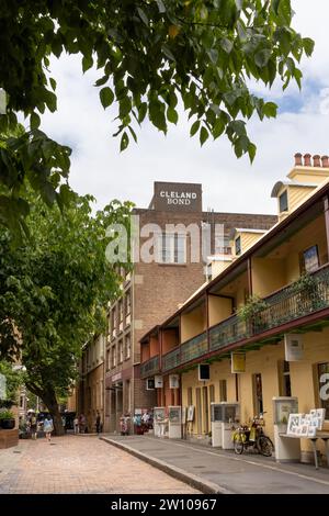 Rangée de maisons-terrasses historiques à Playfair Street, The Rocks, Sydney, abritant des galeries et des magasins. Banque D'Images