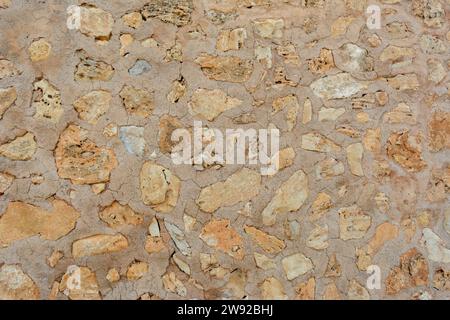 Détails de la texture de pierre de sable, gros plan de la surface de roche, idée pour l'arrière-plan ou la toile de fond Banque D'Images