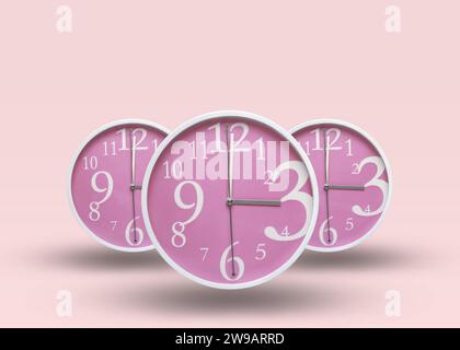 Ensemble de trois horloges violettes douces sur un fond rose pastel. Banque D'Images