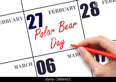 Février 27. Texte d'écriture à la main Polar Bear Day à la date du calendrier. Enregistrez la date. Vacances. Concept du jour de l'année. Banque D'Images