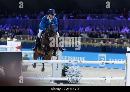 Christian Ahlmann d'Allemagne avec Dourkhan Hero Z lors de la compétition de saut d'obstacles Léon Melchior CSI5*-W au Jumping Mechelen le 27 décembre 2023, Nekkerhal, Belgique (photo de Maxime David - MXIMD Pictures) Banque D'Images