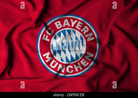 Mise au point sélective du logo du FC Bayern Munich. Club de football à Munich, Bavière ALLEMAGNE. avec une texture de tissu fluide. Illustration 3D. Banque D'Images