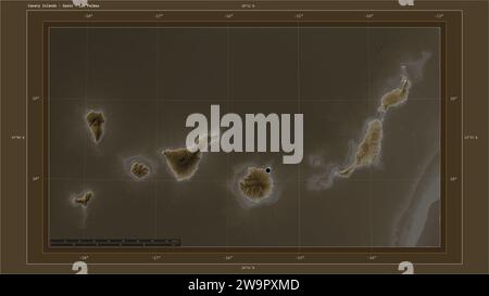 Îles Canaries - Espagne mis en évidence sur une carte d'altitude colorée dans les tons sépia avec des lacs et des rivières carte avec le point de la capitale du pays, cartographique Banque D'Images