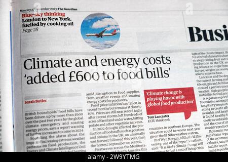 « Les coûts du climat et de l'énergie » ont ajouté 600 £ aux factures alimentaires » le journal Guardian en gros titre article sur la crise du coût de la vie 27 novembre 2023 Londres Angleterre Royaume-Uni Banque D'Images