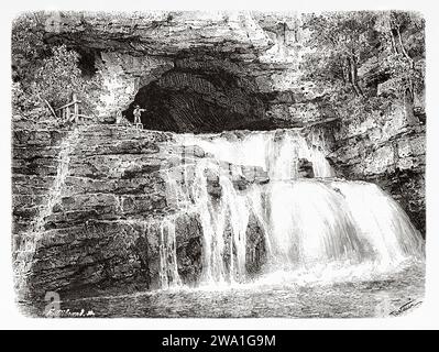 Cascade de la source du Lison, Nans-sous-Sainte-Anne. Bourgogne-Franche-Comté, France, Europe. Le saut du Doubs, frontière franco-suisse. Souvenir de Franche Comté par Charles Joliet (1832 - 1910) gravure ancienne du 19e siècle du Tour du monde 1880 Banque D'Images