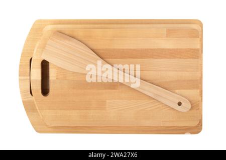 Spatule de cuisine sur des planches à découper en bois sur fond blanc. Espace de copie. Banque D'Images