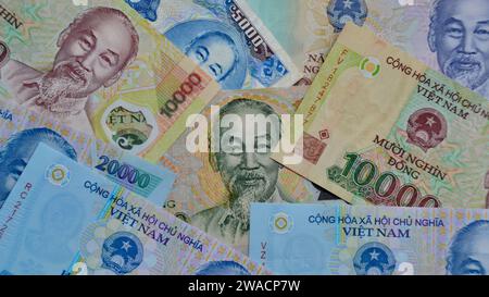 Concept pour la finance, la richesse et l'échange de devises avec une image plein cadre de Vietnam Dong montrant le visage du célèbre politicien et leader Ho Chi Minh Banque D'Images