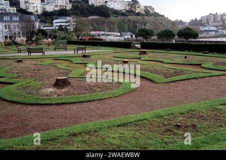 Les souches des palmiers emblématiques des jardins d'Abbey Park (jardins italiens) sur le front de mer de Torquay. Banque D'Images
