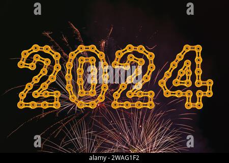 Un feu d'artifice contre le ciel nocturne avec 2024 Happy New Year fabriqué à partir de maillons de chaîne dorés Banque D'Images
