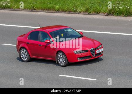 2008 Rouge Alfa Romeo 159 Lusso 16V JTDM 150 Berline voiture Diesel 1910cc Banque D'Images