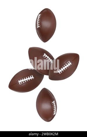 Beaucoup de balles de football américain volant sur fond blanc Banque D'Images