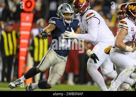 Landover, MD, États-Unis. 07 janvier 2024. Micah Parsons (11), le linebacker des Dallas Cowboys, pousse le passeur lors du match de la NFL entre les Dallas Cowboys et les Washington Commanders à Landover, MD. Reggie Hildred/CSM/Alamy Live News Banque D'Images