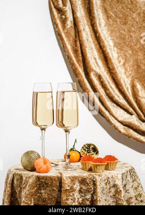 verres à champagne et tartelettes au caviar Banque D'Images