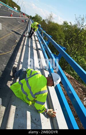 Réparation de routes sur l'autoroute M74, au sud de Glasgow, en Écosse Banque D'Images