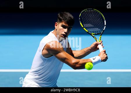 Melbourne, Victoria, Australie. 11 janvier 2024. MELBOURNE, AUSTRALIE - JANVIER 11 : Carlos Alcaraz d'Espagne termine une séance d'entraînement avec Stan Wawrinka de Suisse avant l'Open d'Australie 2024 à Melbourne Park le 11 janvier 2024 à Melbourne, Australie. (Image de crédit : © Chris Putnam/ZUMA Press Wire) USAGE ÉDITORIAL SEULEMENT! Non destiné à UN USAGE commercial ! Banque D'Images