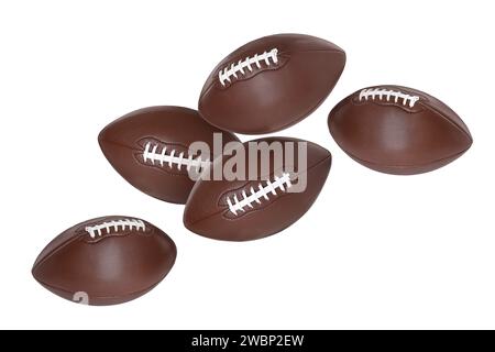 Beaucoup de balles de football américain volant sur fond blanc Banque D'Images