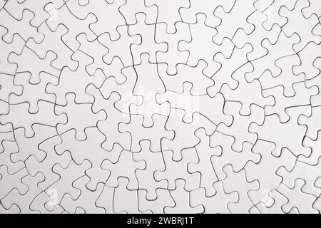 Puzzle radial blanc simple résolu, texture abstraite gros plan Banque D'Images