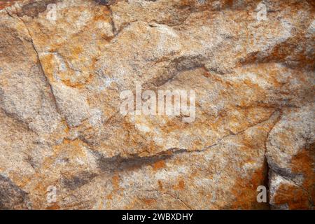 Texture de fond de pierre en brun, tan et blanc Banque D'Images