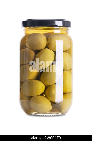 Olives vertes avec fosse, marinées entières, grandes olives de table grecques, dans un bocal en verre avec bouchon à vis. Fruits entiers, cueillis quand ils ne sont pas encore mûrs. Banque D'Images